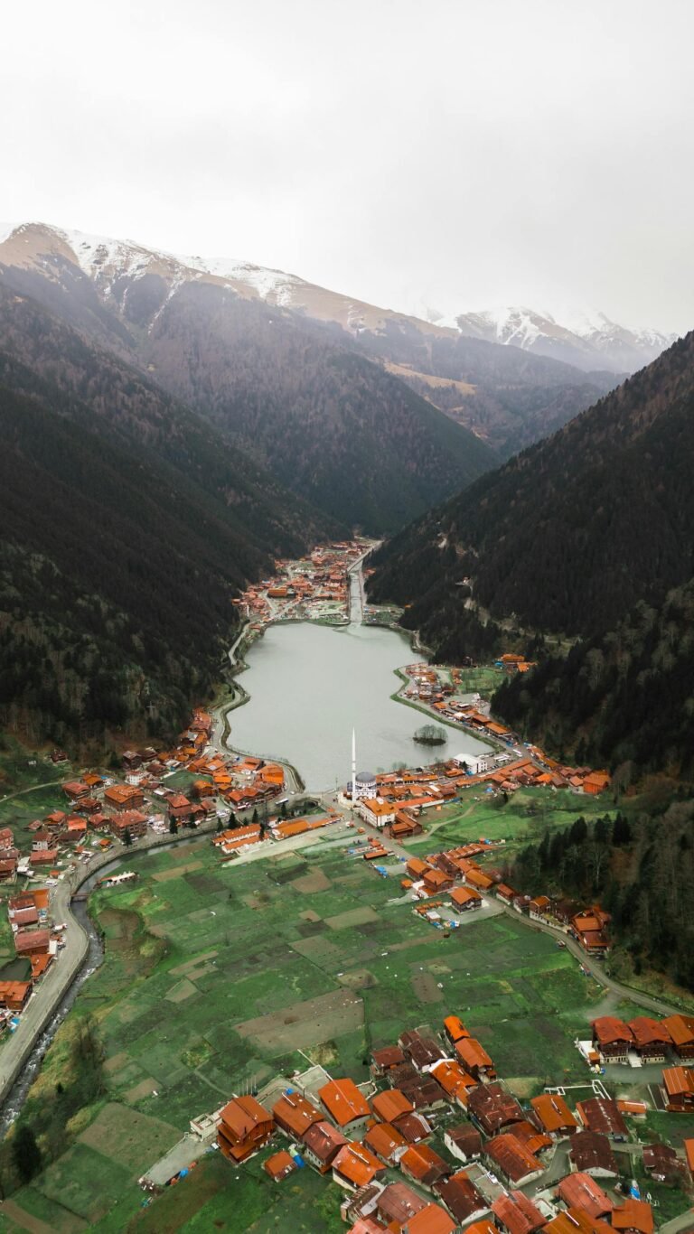 Uzungöl lake surrounded by misty green mountains, Black Sea region, Turkey